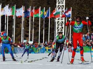 Лыжный мужской командный спринт. Алексей Петухов - крайний слева