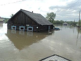 Собственники 13 236 домов, пострадавших от паводка на Алтае, получили по 10 тыс. руб. из краевого бюджета