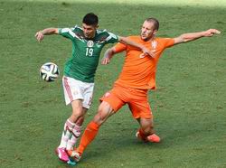 Голландия вышла в четвертьфинал ЧМ-2014 по футболу, одержав волевую победу над Мексикой