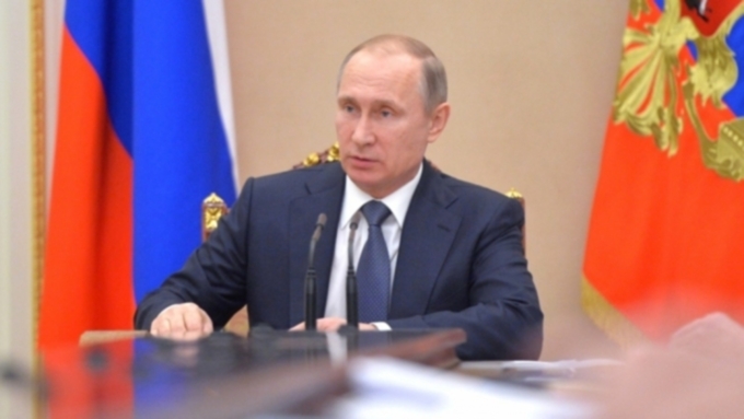 Владимир Путин подписал так называемый закон об ипотечных каникулах / Фото: пресс-служба Кремля