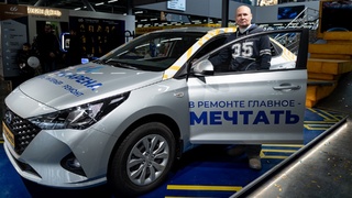 Победитель и главный приз розыгрыша / Фото: Дмитрий Днепровский