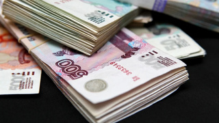 Пачки купюр / Фото: flickr.com   