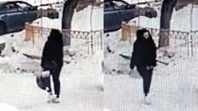 Молодая мать несет новорожденного на мусорку / Фото: "КП-Новосибирск"