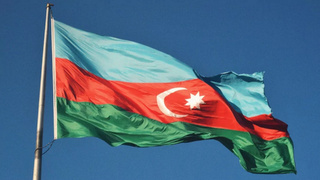 Азербайджанский флаг / Фото: unsplash.com / Hikmat Gafarzada