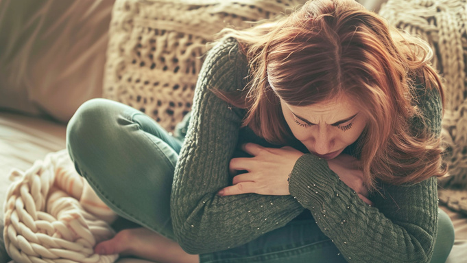 Боль в животе / Изображение сгенерировано нейросетью Midjourney / amic.ru