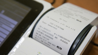 Кассовый чек и аппарат / Фото: amic.ru