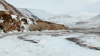 Заснеженные горные вершины на Алтае / Фото: Эркин Тадыров / Сайлюгемский нацпарк