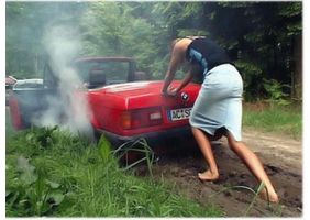   Женщина за рулем...
