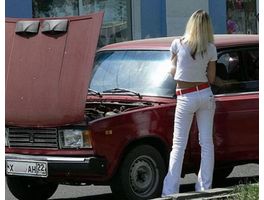   Женщина за рулем...
