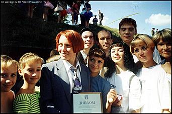    Октябрьскому району 65 лет